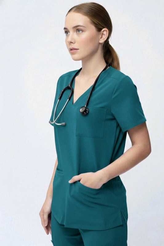 Person wearing teal medical scrubs with a stethoscope on a white background