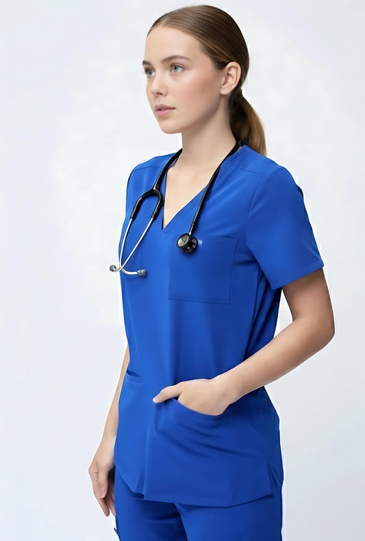 Person wearing a royal blue scrub set with a stethoscope on a white background
