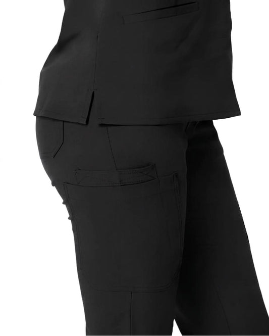 Close-up of a person wearing black scrub pants and a matching black scrub top against a plain white background.