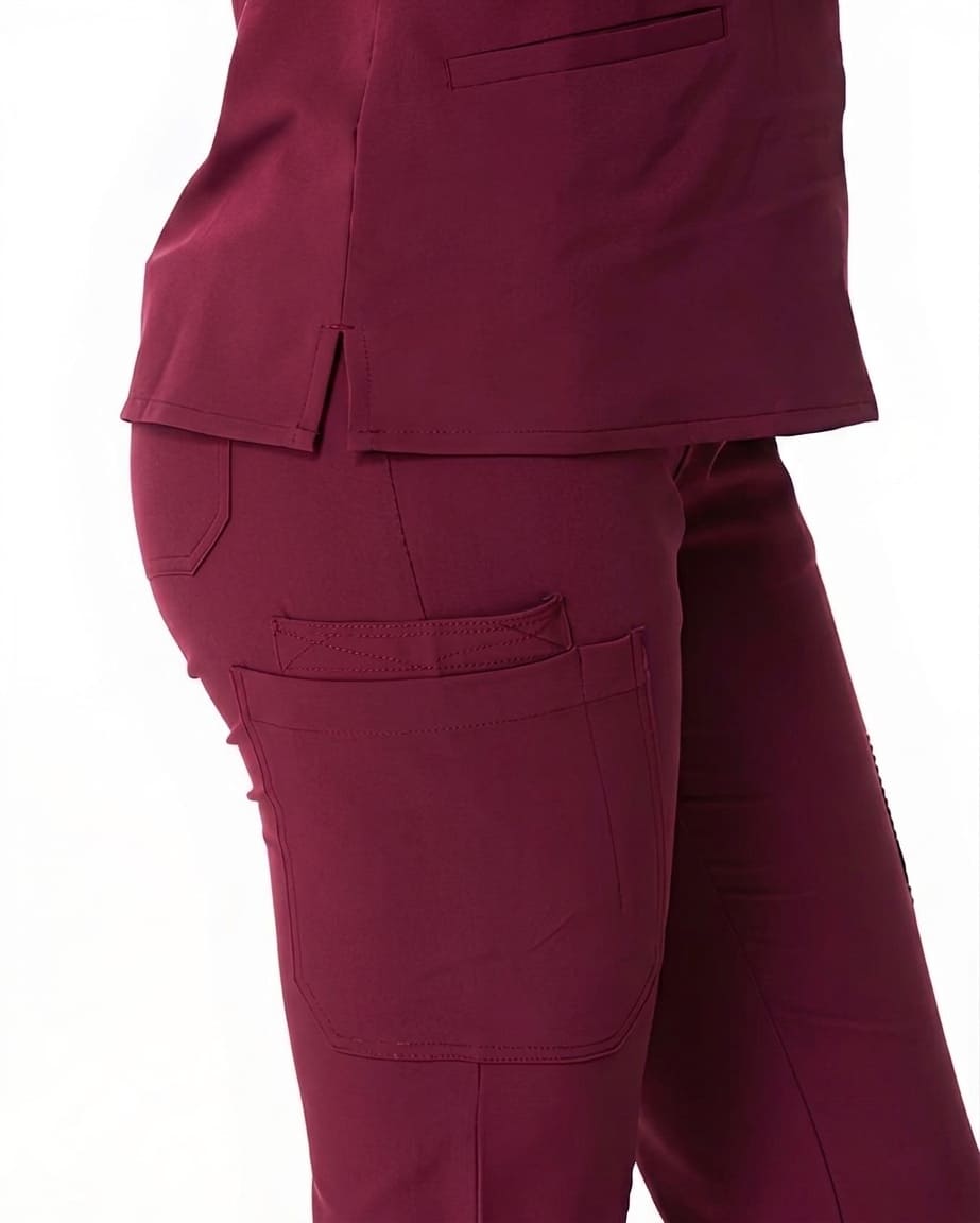 Maroon scrub pants on a white background