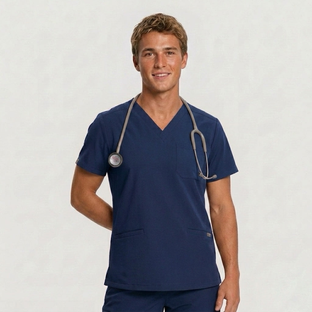 Person wearing navy blue medical scrubs with a stethoscope on a light gray background