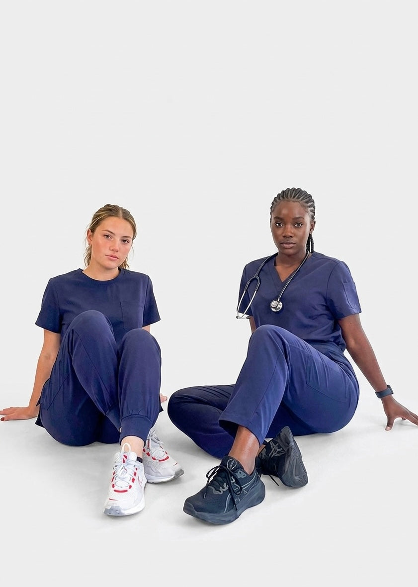 nurses wearing navy scrubs
