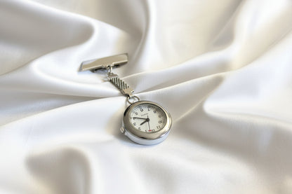 Pocket watch with chain on crumpled paper