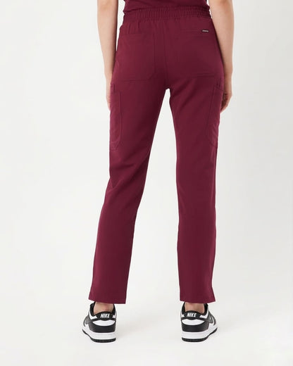 Maroon pants worn by a person on a white background