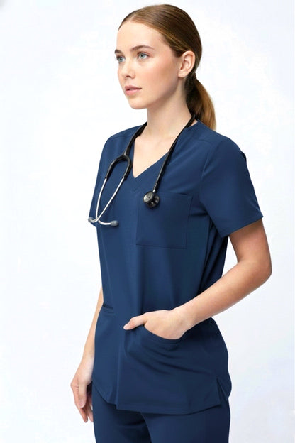 Person wearing navy blue medical scrubs with a stethoscope on a white background